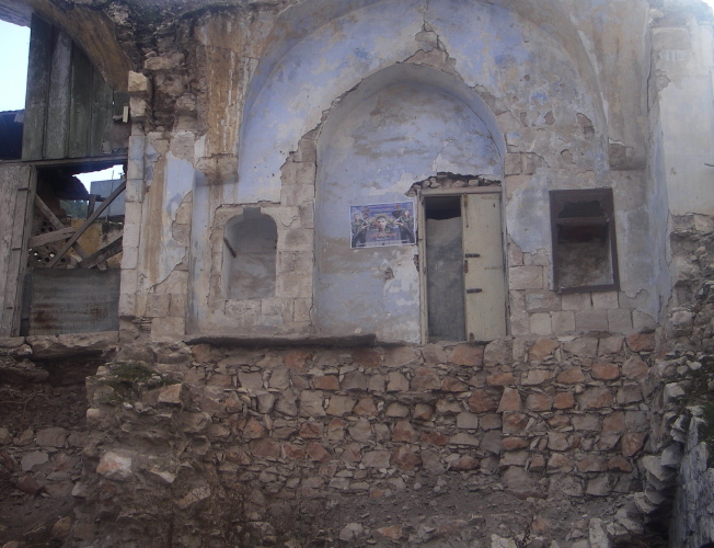 Remains of bulldozed house.