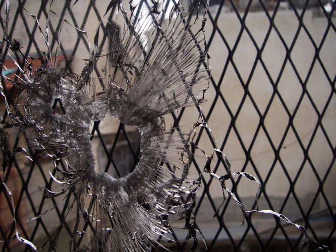 Bullet Hole in Children's Bedroom Window